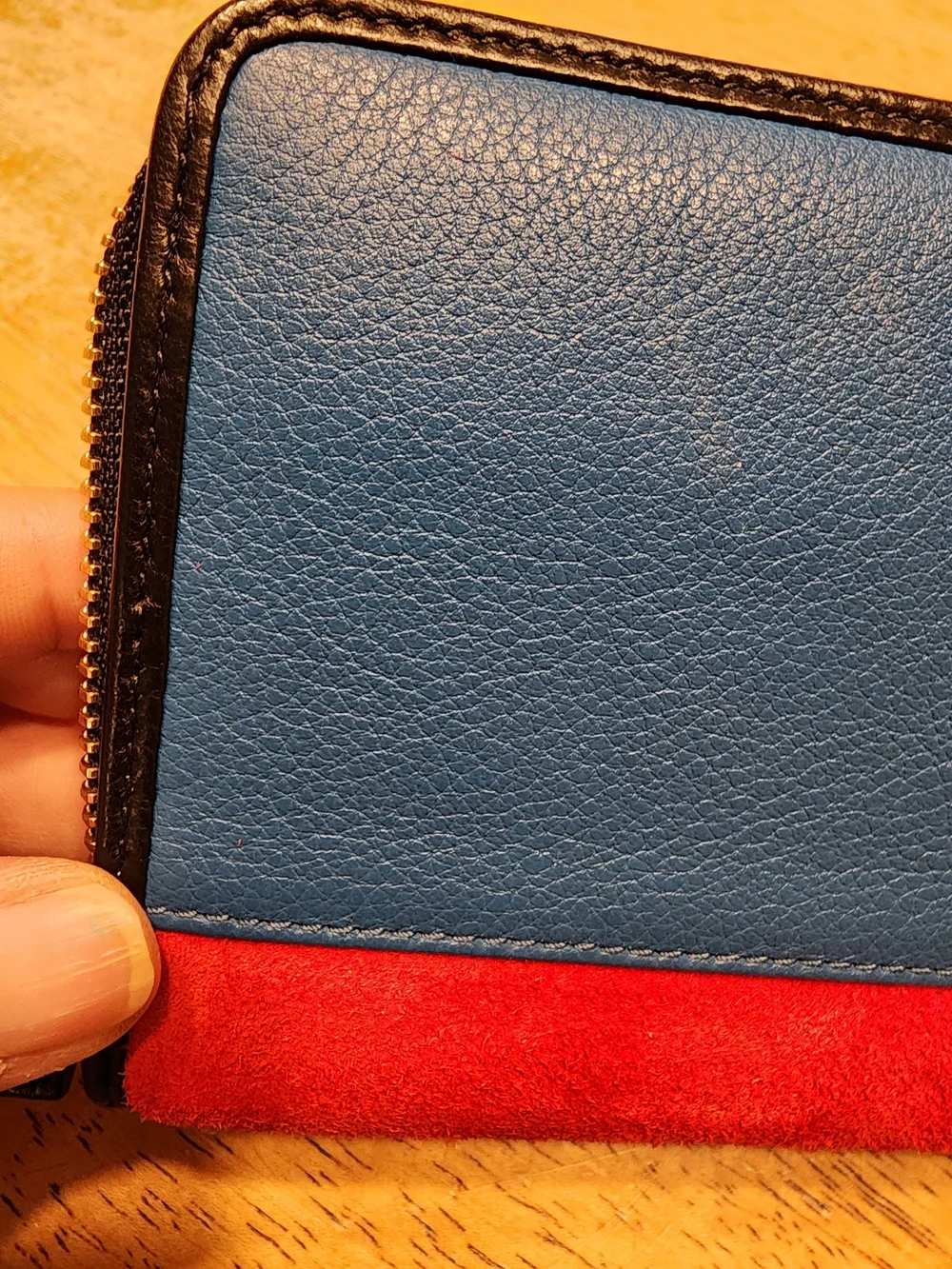Loewe wallet features  vibrant red suede body & black crocodile Embossed Leather